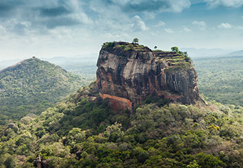 Scenic view of Sigiriya surrounded by lush green